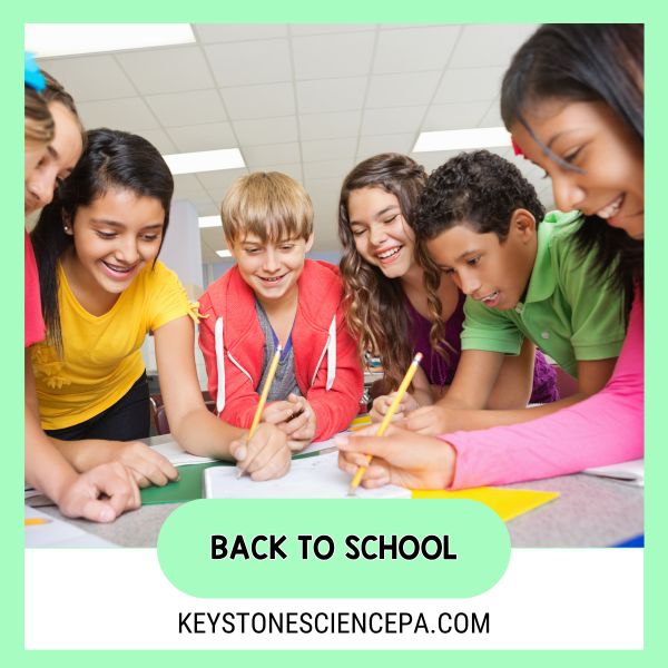 a header image with students circled around a piece of paper and writing. Blog category is Back to School and the URL for the Keystone Science website.